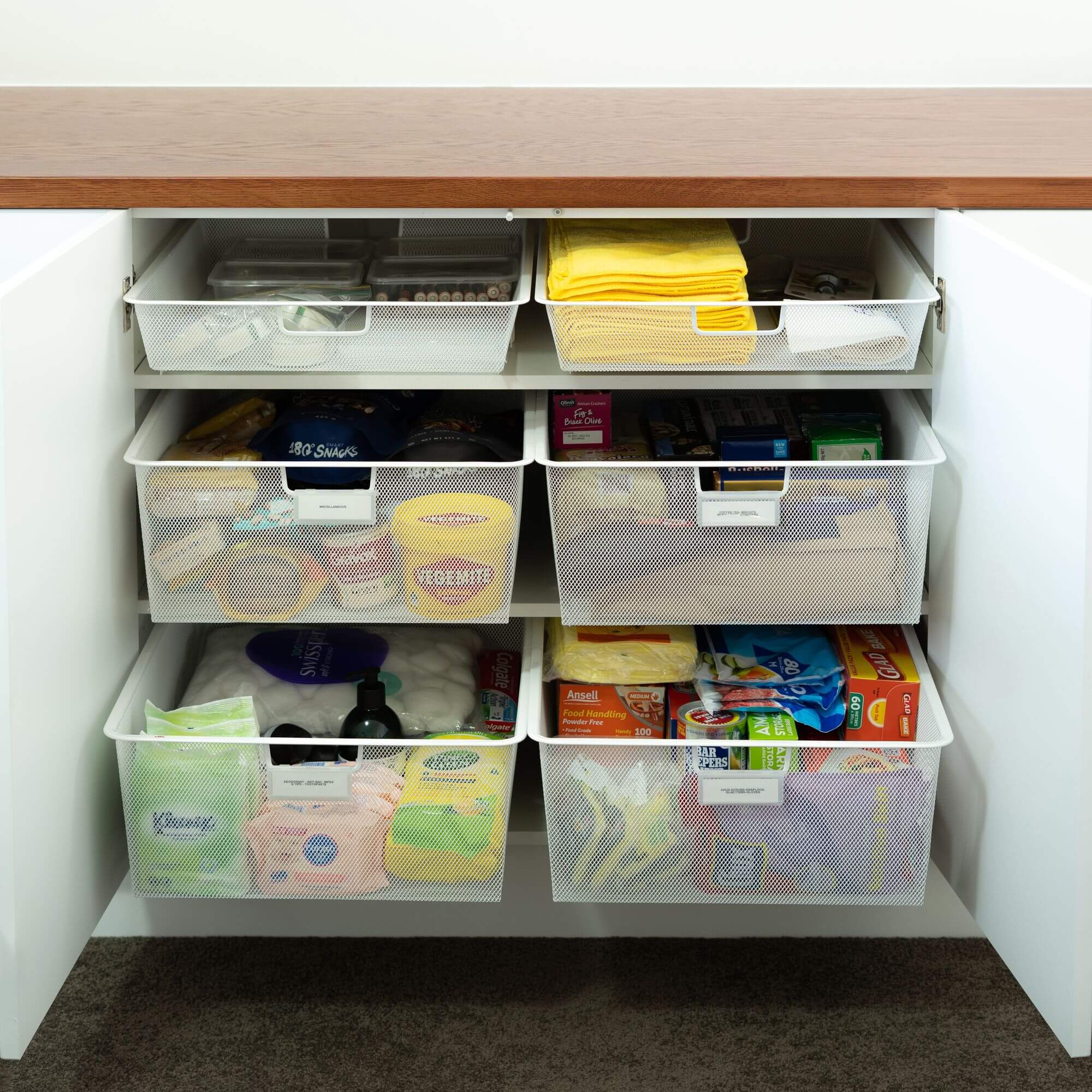 The Elfa Easy Glider system installed in kitchen cupboards