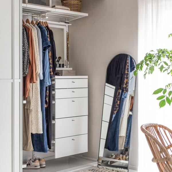 White Elfa Decor Drawer Fronts installed in a wardrobe