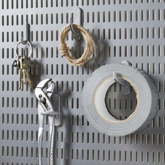 Keys, tape and tools stored on a Platinum Elfa Storing Board